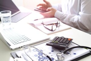 veterinarian working on accounting